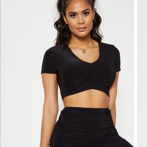 Black slinky top from PLT